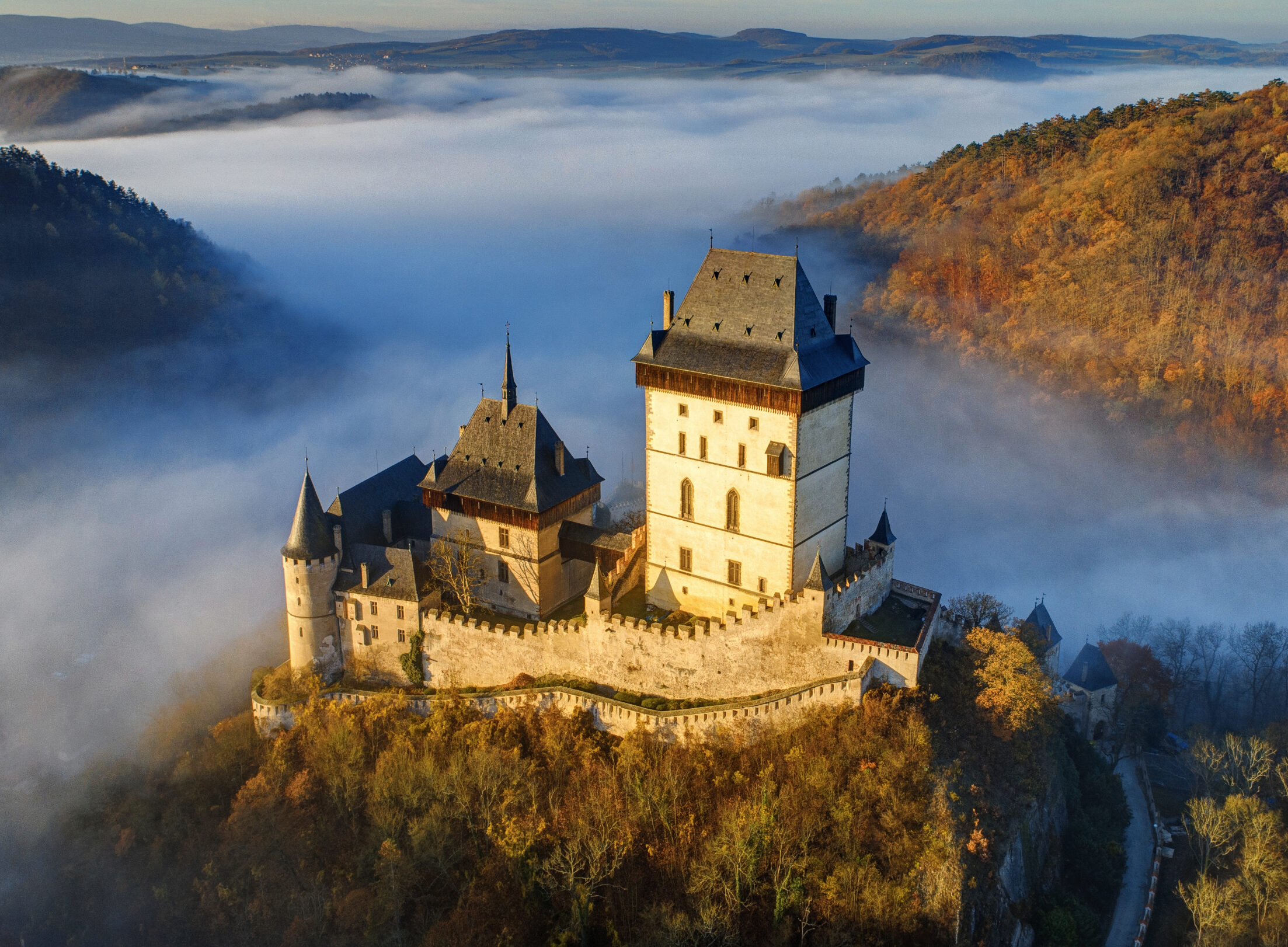 Aerial view of Karlštejn Castle in spring morning mist, Central Bohemia – Private Tours Czech