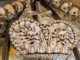 Detail of skull and bone decoration inside the Sedlec Ossuary Bone Church in Kutná Hora