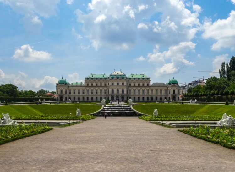 Upper Belvedere Palace in Vienna with formal baroque gardens and sculptures — a must-see on any Vienna day trip from Prague