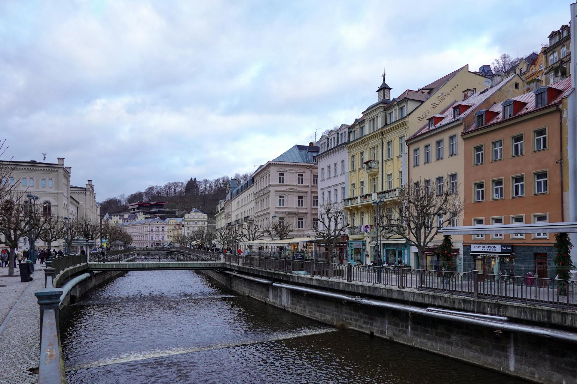 Colourful buildings along the Teplá River in Karlovy Vary on a&nbsp;sunny day