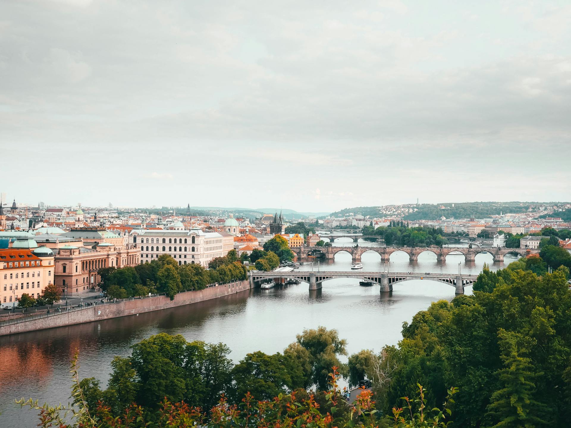 Aerial panoramic view of Prague with the Vltava River and historic bridges