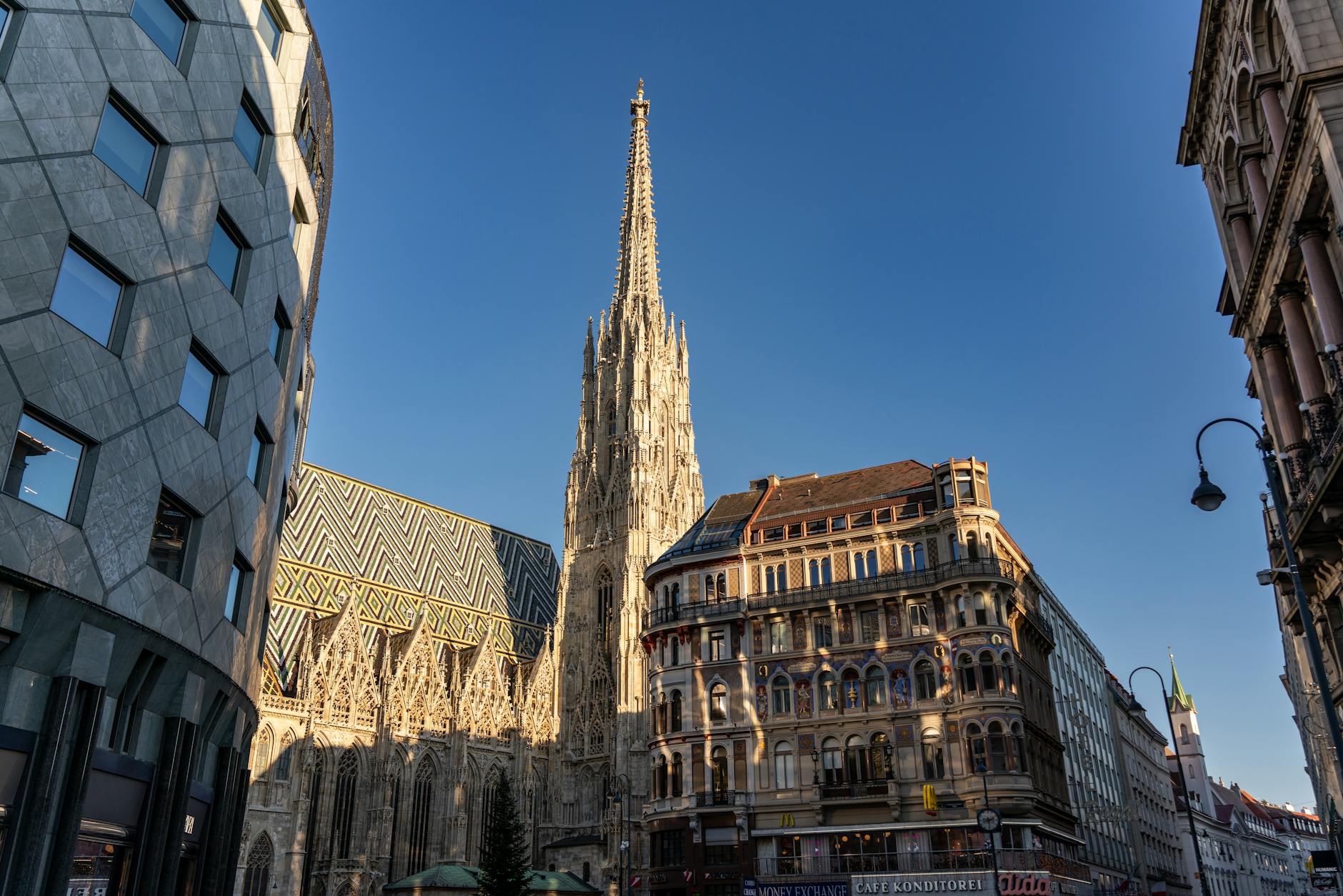 St Stephen's Cathedral (Stephansdom) spire rising over Vienna's historic Innere Stadt, surrounded by elegant baroque architecture