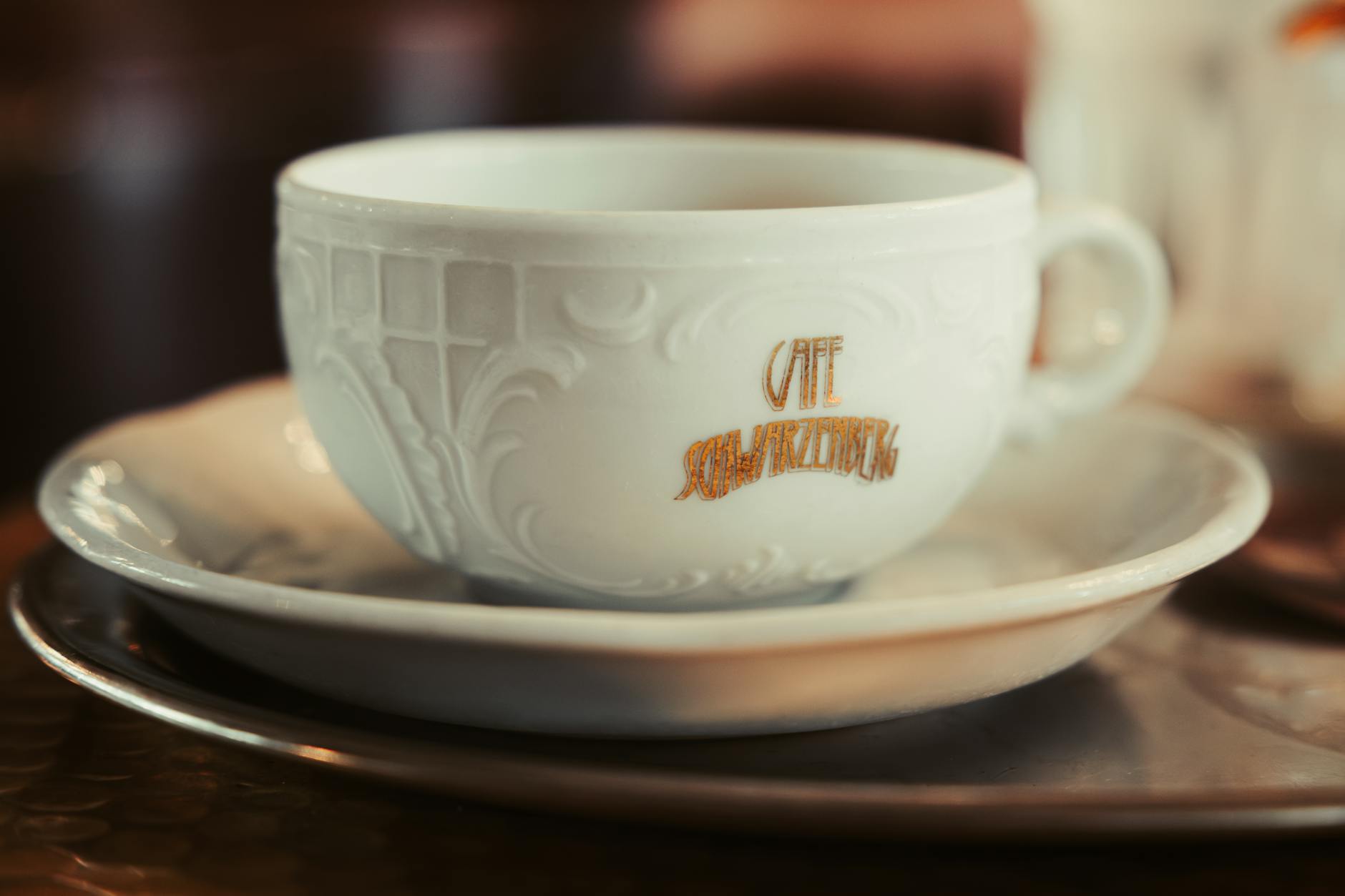 Classic Viennese coffee in an elegant decorated cup at Cafe Schwarzenberg in Vienna