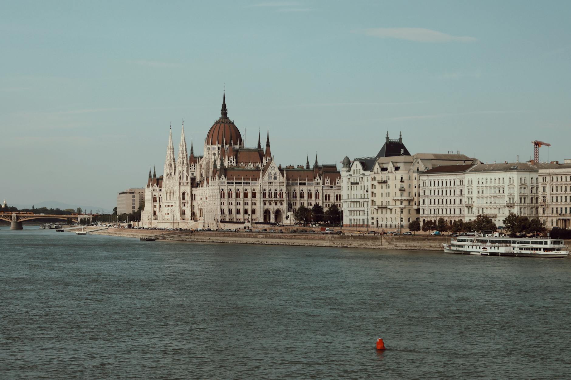 Captivating view of the Hungarian Parliament Building alongside the Danube in Budapest.