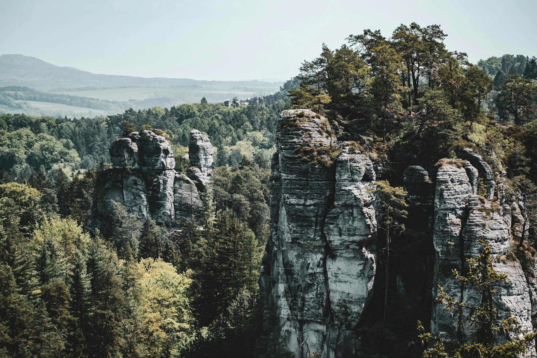 Explore the stunning rock formations of Český ráj, captured in vibrant spring colors.